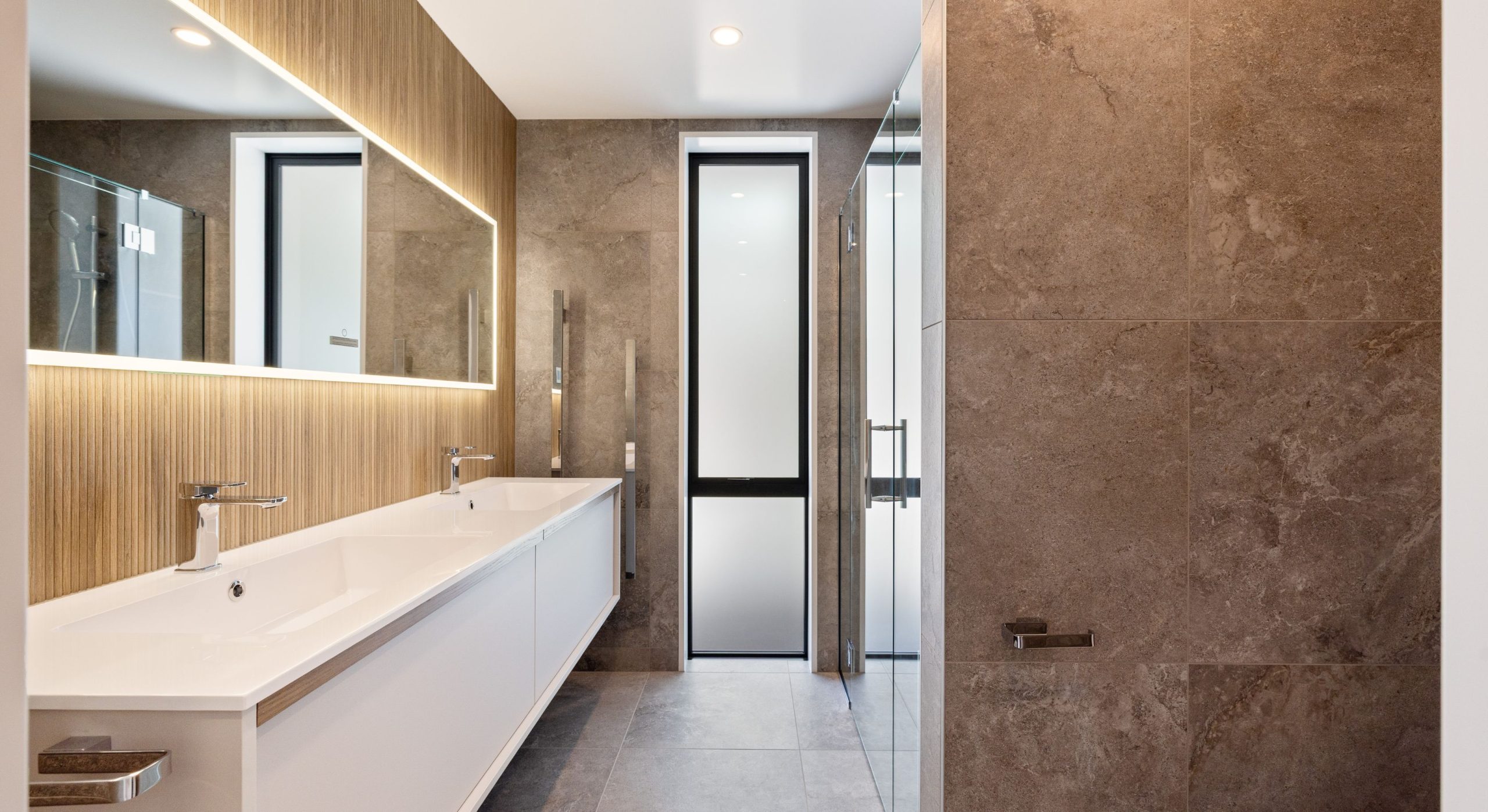 sleek tiled bathroom with modern fixtures