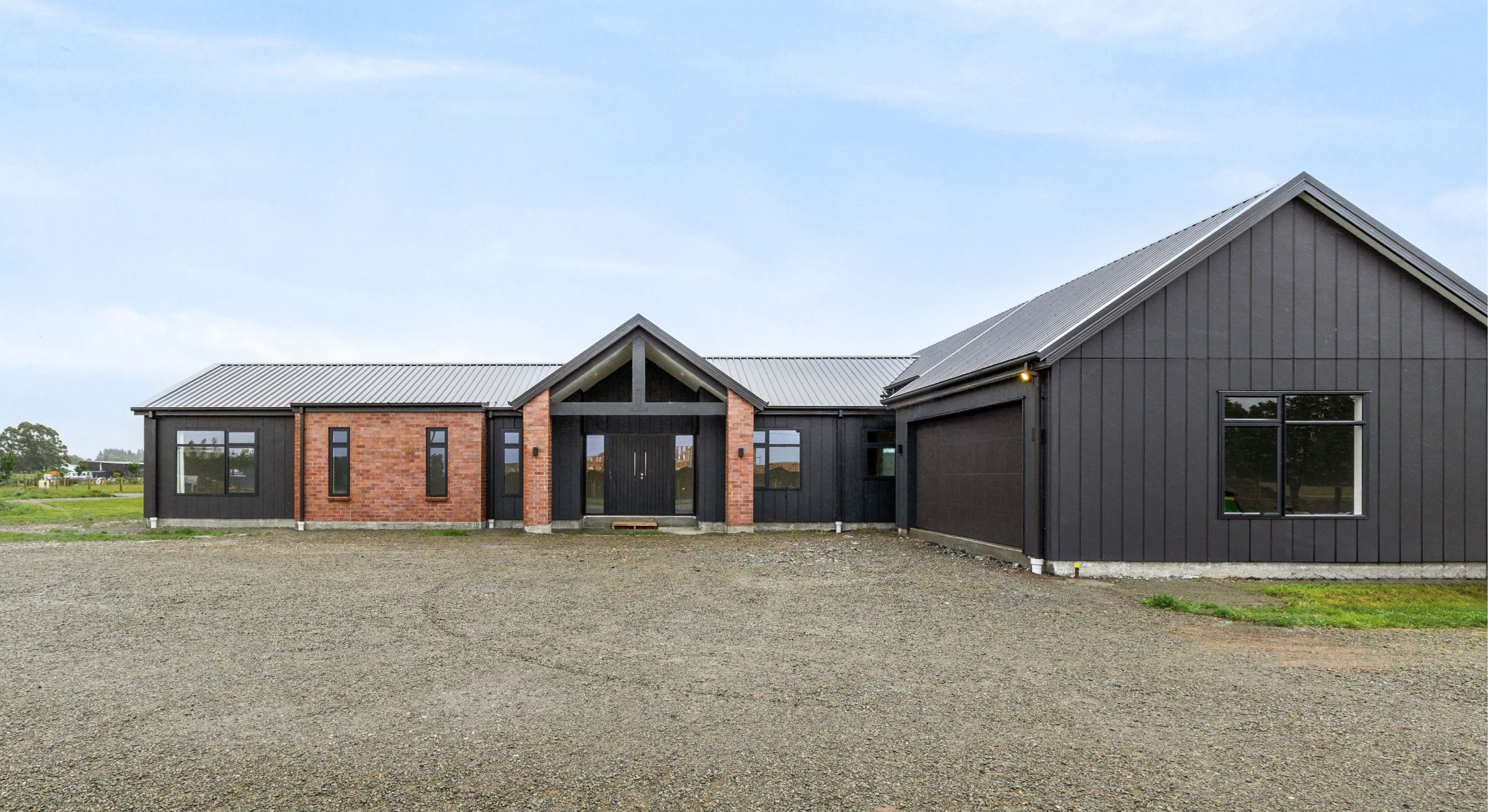 farmhouse with feature red brick
