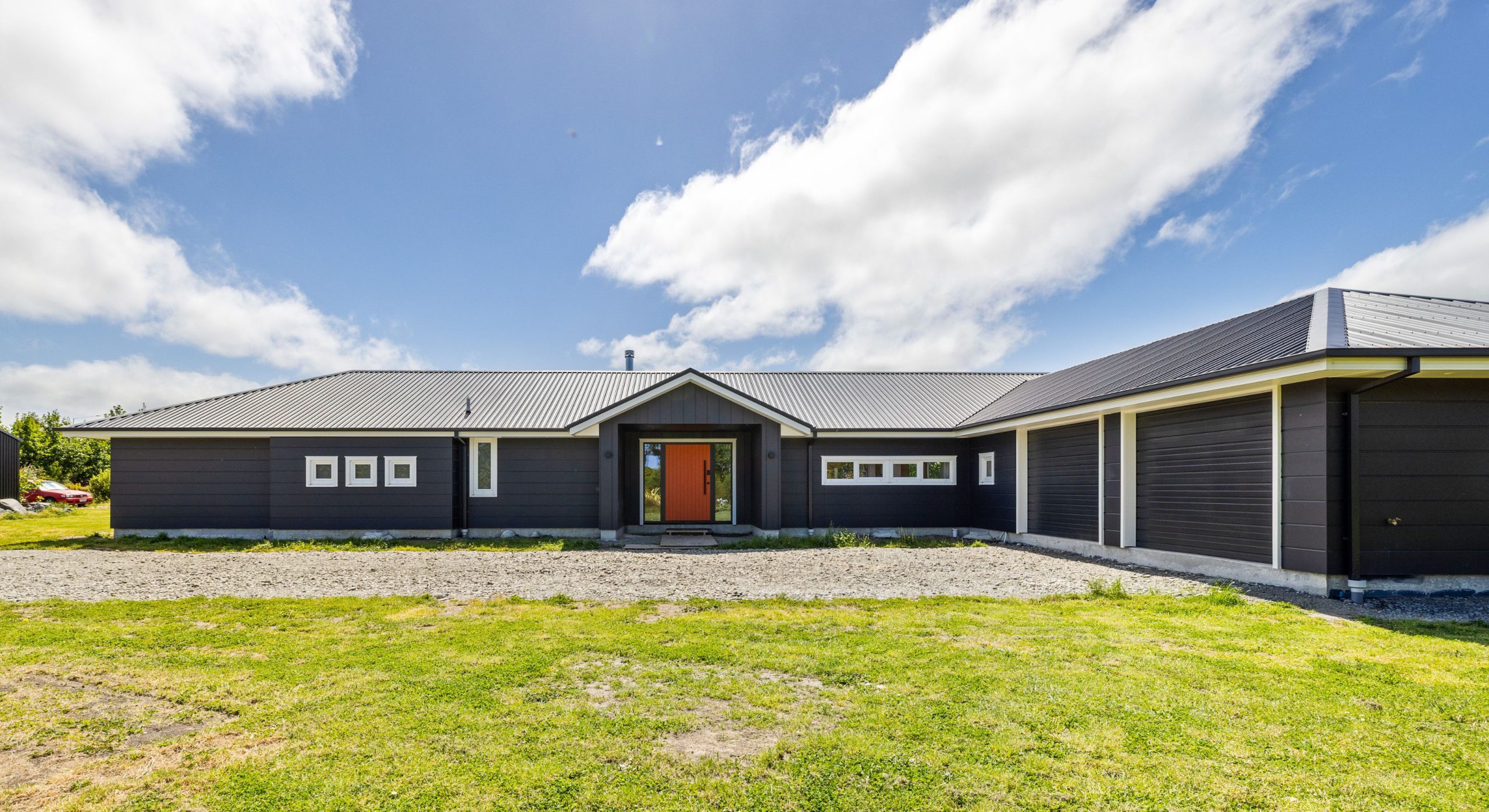 modern farmhouse with feature front door