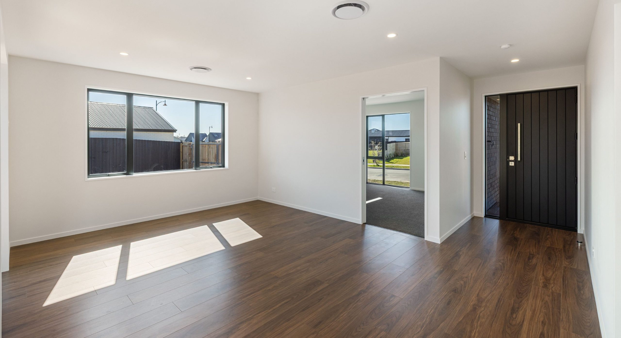 open living and dining with a Dark laminate