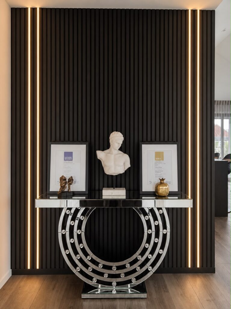 Gold Award and Category Winner trophies displayed in Nick and Chamal's $750,000–$1 million Hallmark Homes build